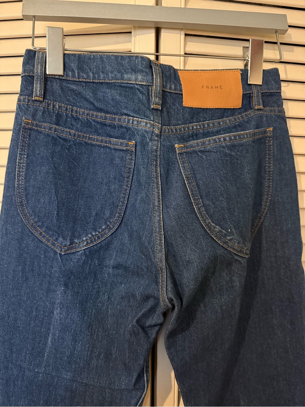 Frame Denim Straight-Leg Jeans in Dark Blue with Leather Patch